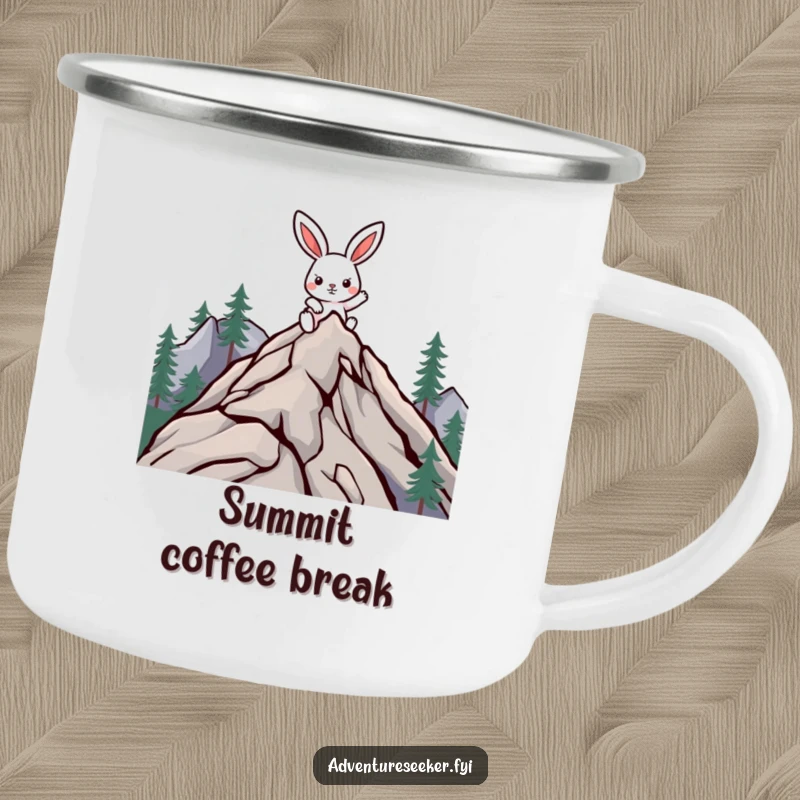Funny climbing rabbit camping mug with a determined character climbing a mountain peak, designed for outdoor use.