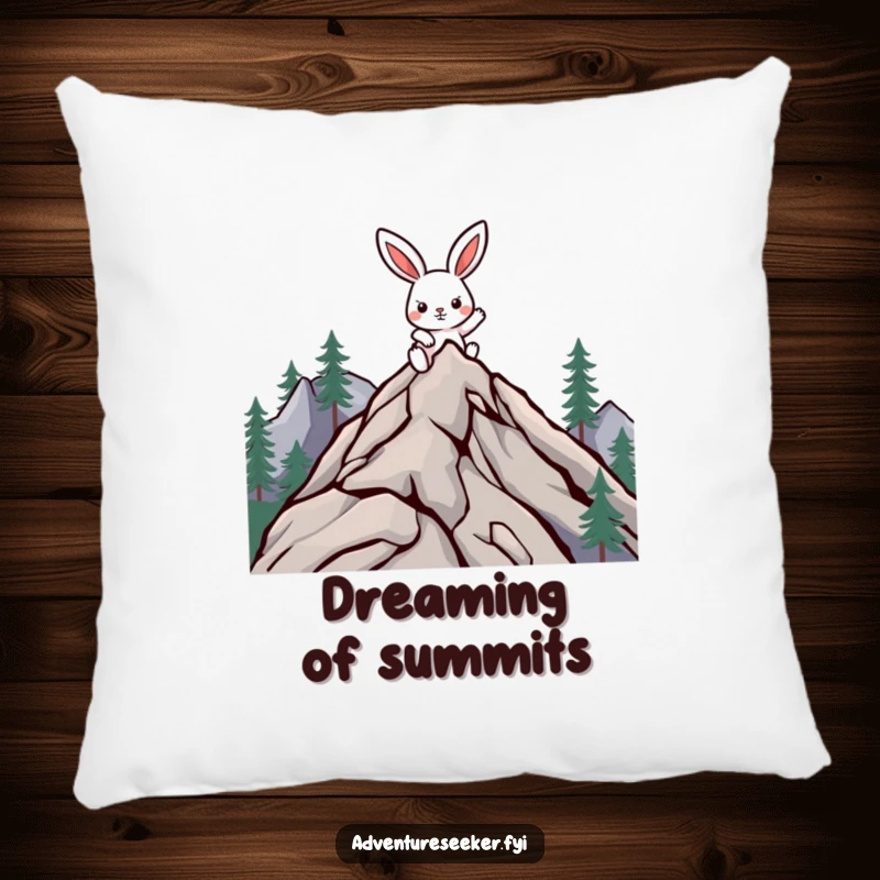 Funny climbing rabbit pillow with a determined character on a mountain peak, providing comfort and humorous inspiration.