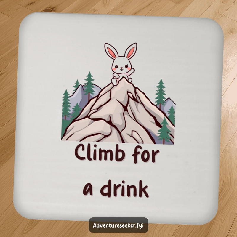Funny climbing rabbit coasters featuring a determined character climbing a mountain, protecting surfaces with humor.