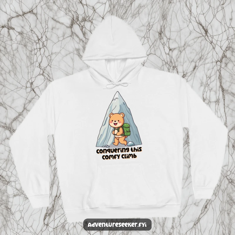 Funny hoodie with a happy bear backpacker reaching a mountain summit, radiating joy and a sense of accomplishment for screen readers.
