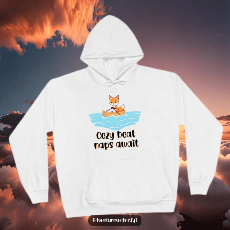 Funny hoodie with a playful fox rowing a tiny boat on a vast ocean, offering warmth and a humorous sense of journey.