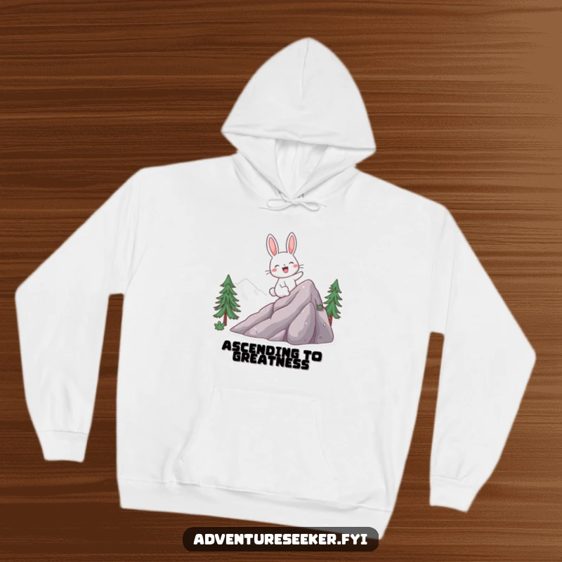 Funny hoodie featuring a giggling rabbit character excitedly climbing a mountain, designed for warmth during any adventure.