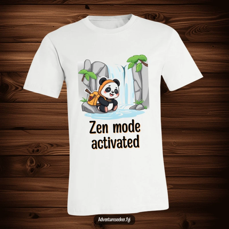 Funny t-shirt with a content panda adventurer relaxing happily by a stylized waterfall, exuding peaceful vibes and joy.