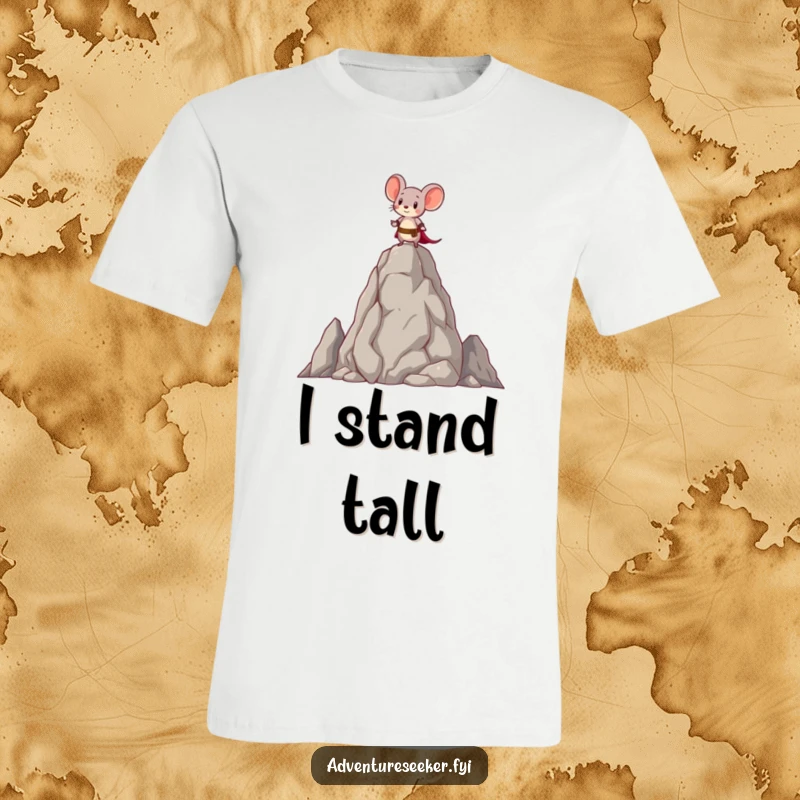 Funny t-shirt depicting a brave little mouse character standing triumphantly atop a tall, ancient rock, embodying courage.