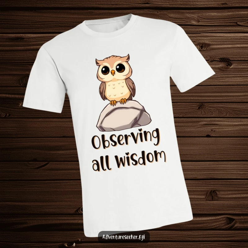 Funny Owl T-Shirt: Curious owl character sitting on a rock, gazing into the distance with wonder.