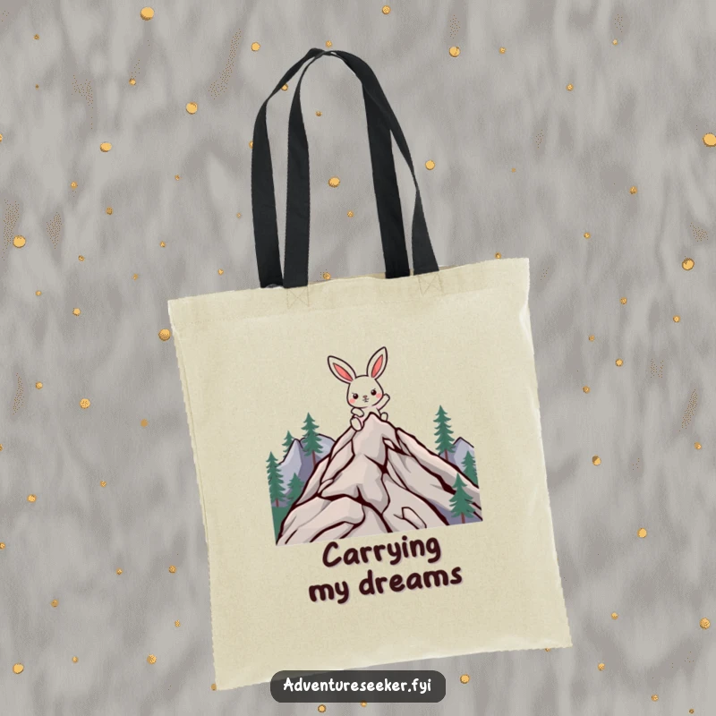 Funny climbing rabbit tote bag featuring a determined character scaling a mountain, perfect for carrying items.