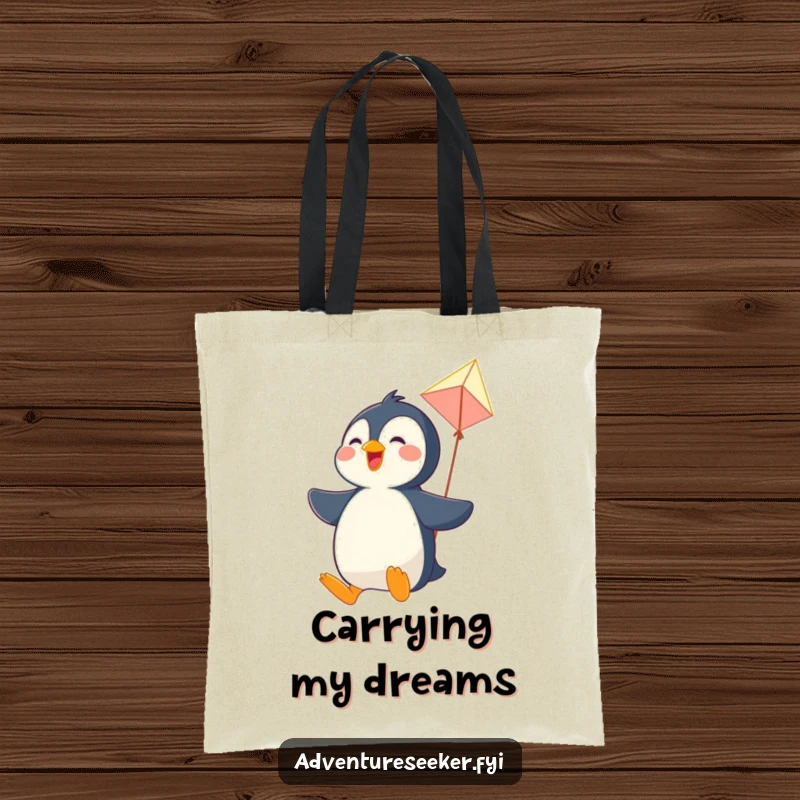 Funny tote bag with a joyful penguin character soaring gracefully through the air on a homemade kite, showcasing fun.