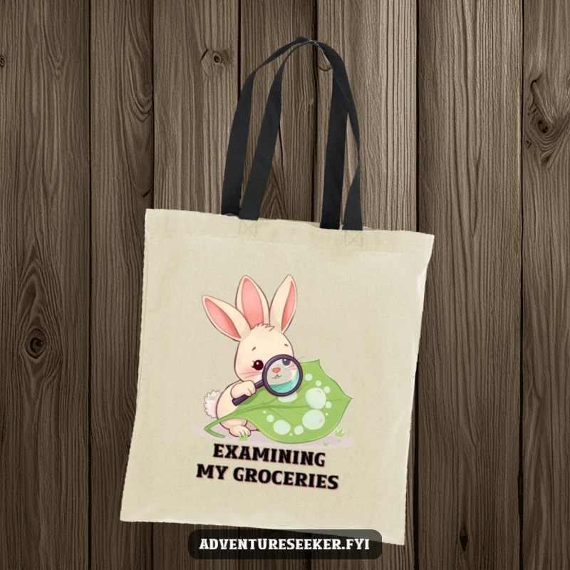 Funny Rabbit Magnifying Leaf Tote Bag. A rabbit uses a magnifying glass on a leaf, making it a stylish bag for nature's explorers.